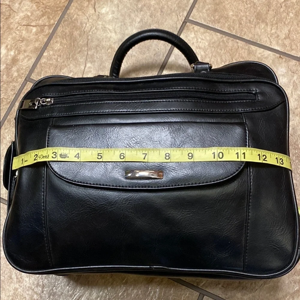 Black Duffel Bag with Structured Design and Smooth Vinyl Practical Utility